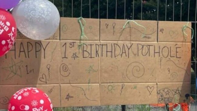 The infamous pothole feature on Maudsley Street, Goomeri, was decorated with birthday balloons and a large birthday card.