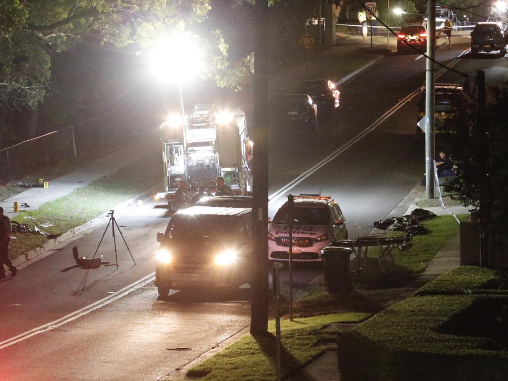 Coroners stretcher waiting outside their van after a fatal accident in Oatlands. Picture: Steve Tyson