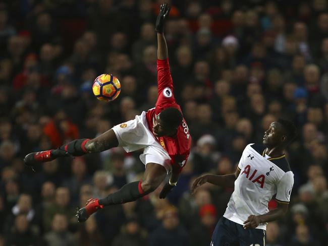 Manchester United's Paul Pogba, left, and Tottenham Hotspur's Victor Wanyama.