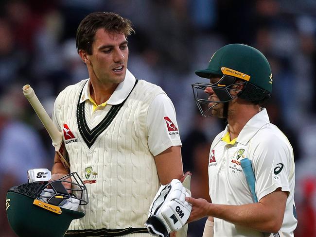 Australia's Pat Cummins (2L), Australia's Travis Head (2L), and England's captain Joe Root leave the field at the end of play on the fifth day of the second Ashes cricket Test match between England and Australia at Lord's Cricket Ground in London on August 18, 2019. - The second Test between England and Australia ended in a draw at Lord's on Sunday. Australia, set an unlikely 267 to win in a minimum of 48 overs after England captain Joe Root's declaration, finished on 154-6. (Photo by Adrian DENNIS / AFP) / RESTRICTED TO EDITORIAL USE. NO ASSOCIATION WITH DIRECT COMPETITOR OF SPONSOR, PARTNER, OR SUPPLIER OF THE ECB