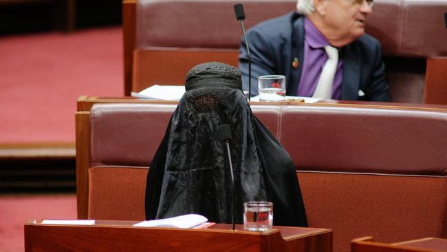 Senator Pauline Hanson wearing a burqa in the senate. Picture: Gary Ramage