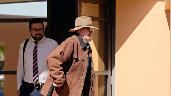 Gardener Owen Laurie leaves the Katherine court house with his barrister, Matthew Littlejohn after giving evidence at the inquest into the suspected death of Paddy Moriarty