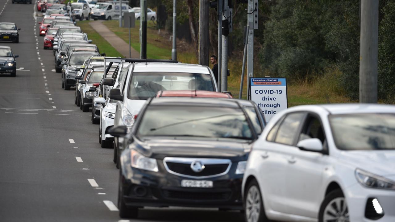 Vehicles queue for a COVID-19 test at a testing station at the popular drinking spot. Picture: Peter Parks/AFP