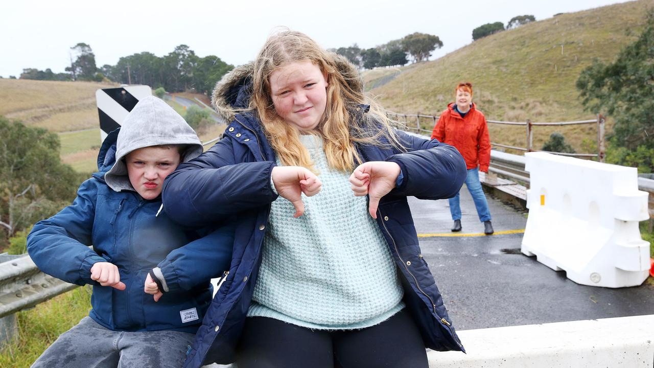 Julie Oataway is frustrated by the closure of the Pollocksford Rd bridge. It means she is cut off from her grandchildren Billy, 9, and Ebony, 12, who live in Bannockburn. Picture: Alan Barber