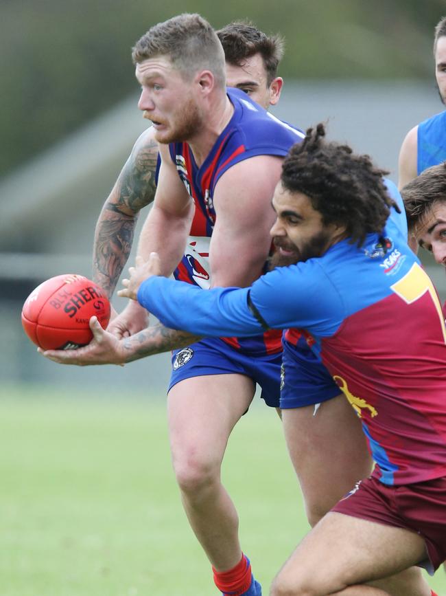 Football GDFL: Belmont Lions v Bell Post Hill Bell Post Hill 8 Jack Yates is tackled by Belmont Lions 7 Jordan Edwards Picture: Mark Wilson
