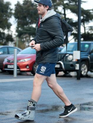 Dangerfield wearing the moon boot earlier on Wednesday at Simonds Stadium. Picture: Alison Wynd