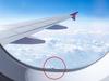 tiny hole plane window x