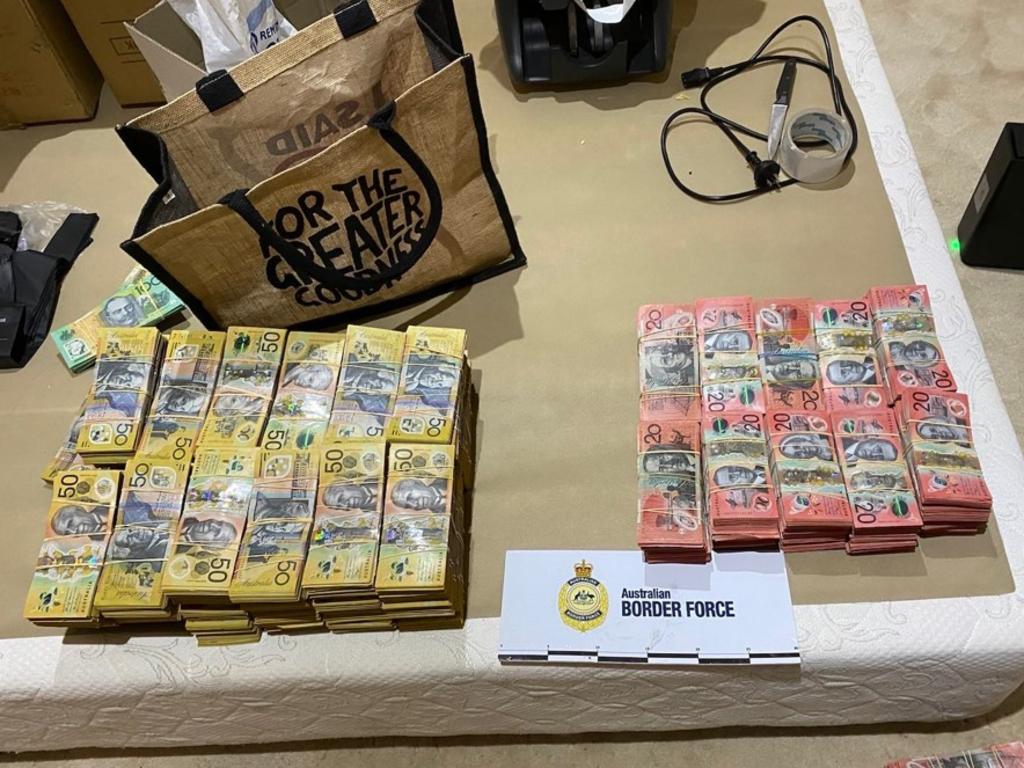 Some of the $1.4m in cash seized after 11 properties across the South East Queensland, Tweed Heads, and Coffs Harbour were raided. Picture:: ABF