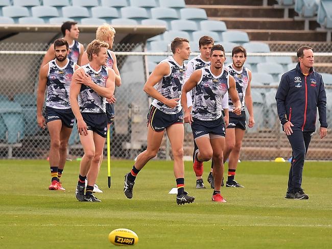 ADELAIDE, AUSTRALIA - JUNE 23: (L-R) Rory Sloane of the Crows, Curly Hampton of the Crows and Adelaide Crows Senior Coach Don Pyke look on during a training session prior to a press conference at AAMI Stadium on June 23, 2018 in Adelaide, Australia.  (Photo by Daniel Kalisz/Getty Images)