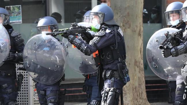 Victoria Police pictured on the streets of Melbourne ready for a lockdown protest.