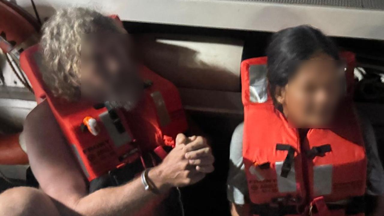 A Dutch man, 51, and UK woman, 42, were also arrested. Authorities said they would be charged with people smuggling. Picture: AFP