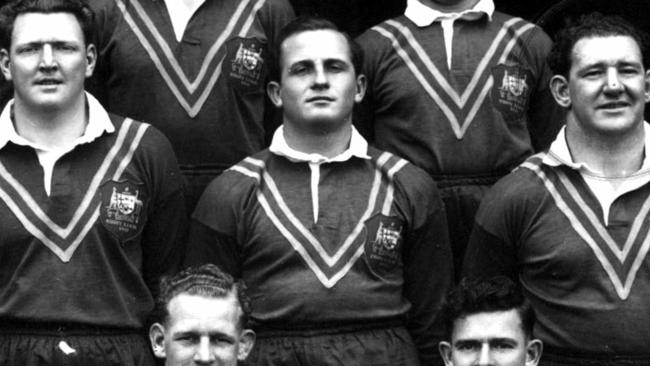 Souths great Harold Crocker, centre, in an Australian team photo. He would later set up the winning try..