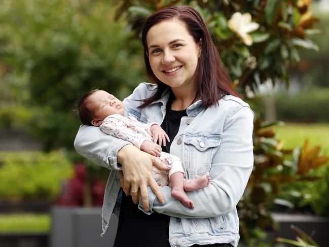 Jody Savage with two-week-old baby Bailee. Weight loss surgery cured her PCOS. Picture: Tim Hunter