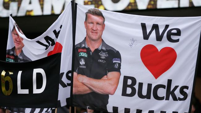 Collingwood fans show their support for Nathan Buckley. Picture: Getty Images