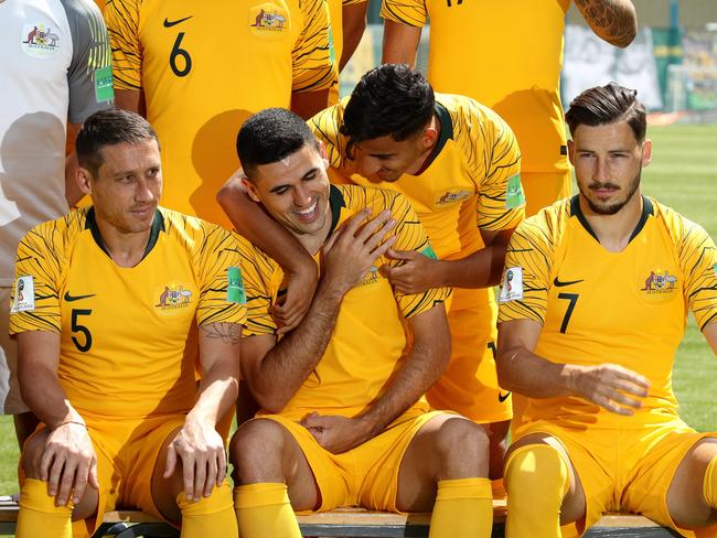 Tom Rogic (C) and Daniel Arzani of Australia joke around. Pic: Getty