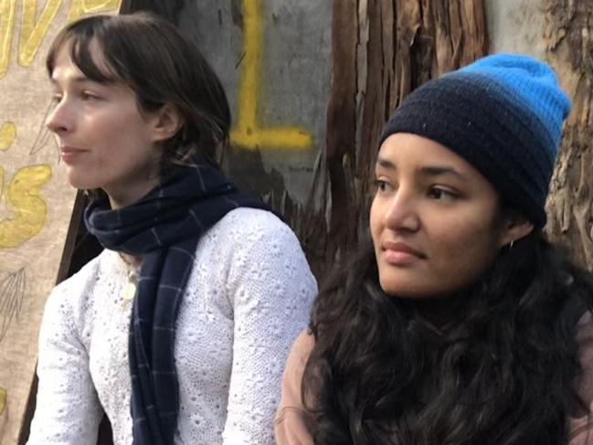 India Schiller (left) of Careel Bay, and Aina Ibrahim, of Cromer, joined the community blockade at Avalon Beach to prevent Northern Beaches Council contractors from cutting down two 70-years gum trees in Ruskin Rowe on June 14, 2024.