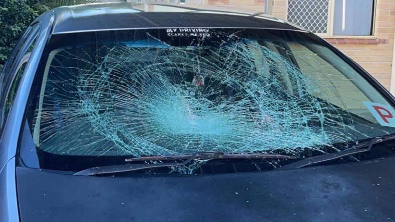 One of the couple's cars with a windscreen smashed by a vandal.