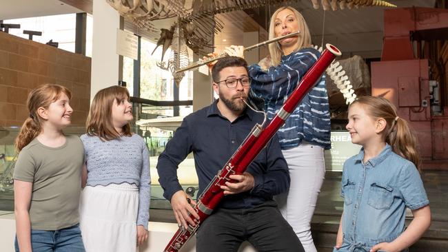 Timothy Rosen, bassoon, and Linda Pirie, flute, from Windsong Quintet with sisters Violet, Olive and Zoe Ferraretto at the SA Museum for On The Terrace. Picture: Andrew Beveridge