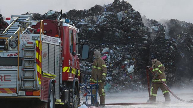 Firefighters fight the Coolaroo recycling plant fire in July 15, 2017. Picture: David Crosling