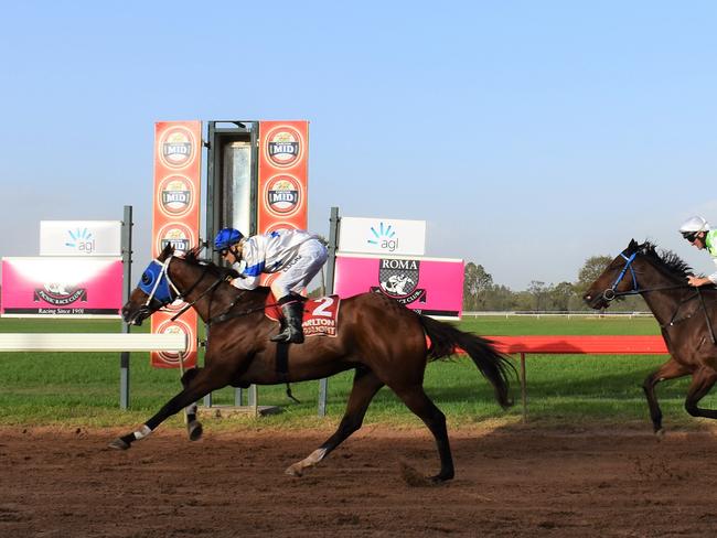 Miles gelding Fab's Cowboy winning for apprentice Minonette Kennedy and trainer Bevan Johnson at Roma's Bassett Park.