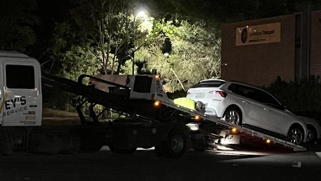 A white SUV involved in the incident being towed from the scene. Picture: Keith Woods