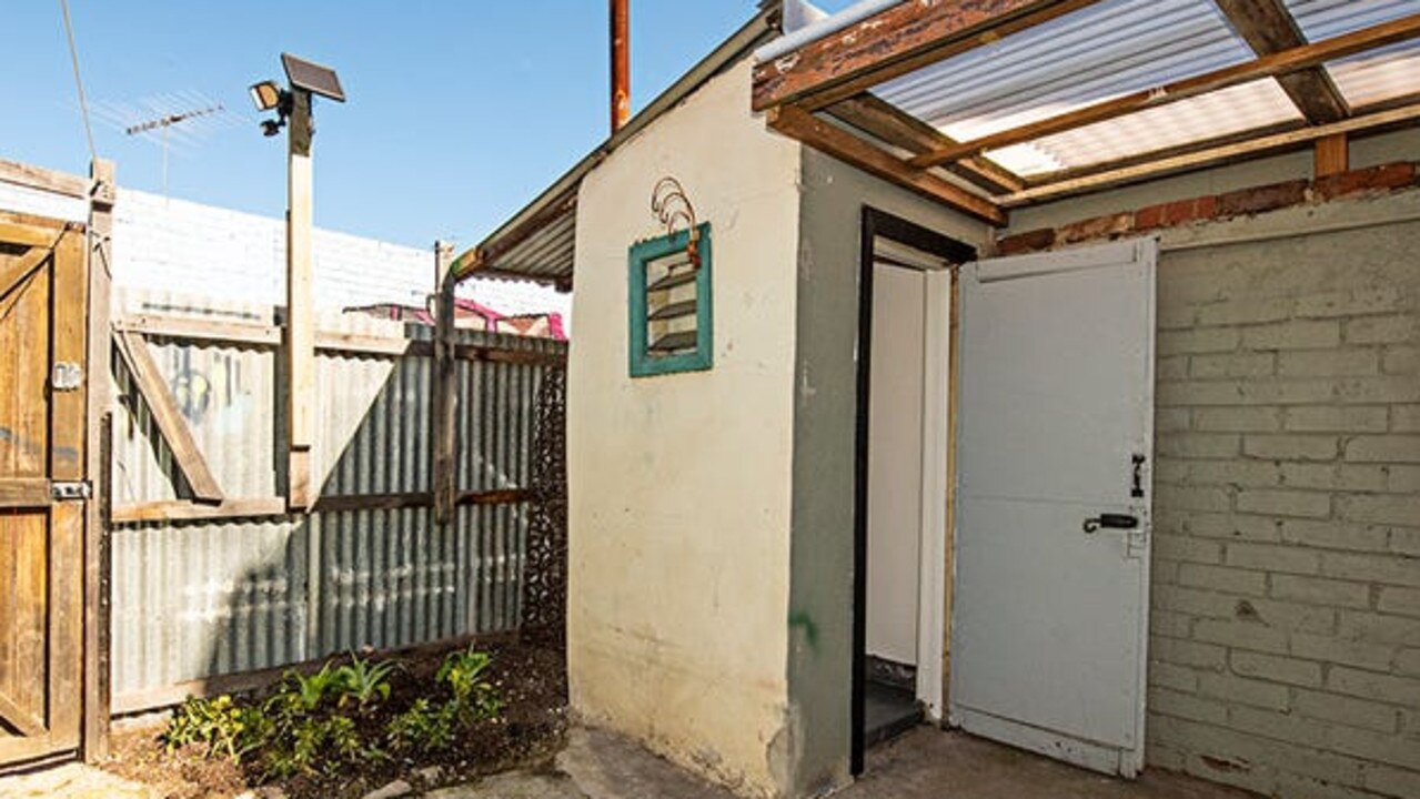 An outhouse in the courtyard.