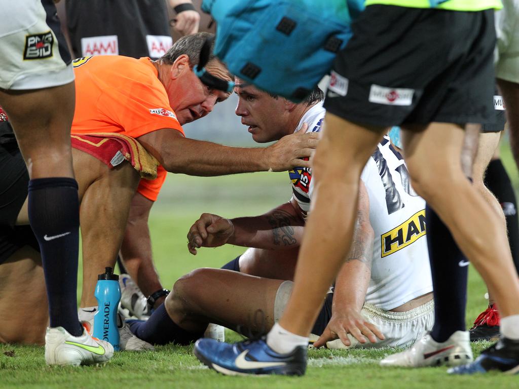 Corey Parker receiving medical attention after a big tackle. Picture: Adam Head