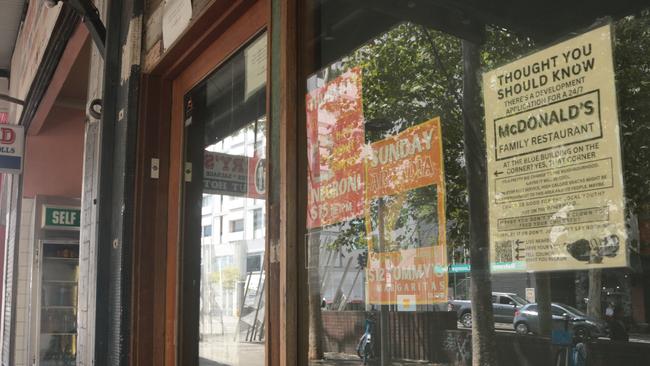 Mr Jank has hung a sign outside his bar to encourage residents to have their say about the development. Picture: News Corp Australia