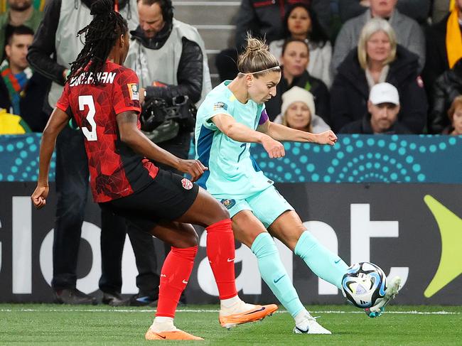 Steph Catley crosses. Picture: Mark Stewart.