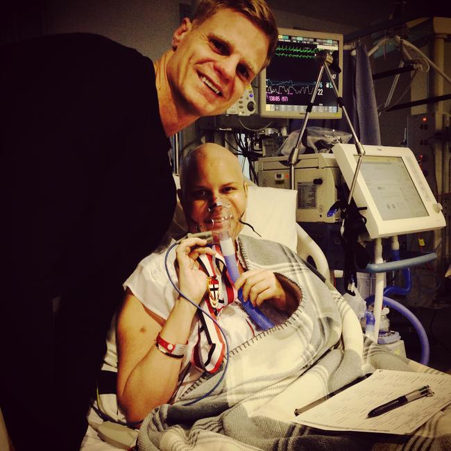 Nick Riewoldt with sister Maddie during one of her many hospital visits. Picture: Supplied