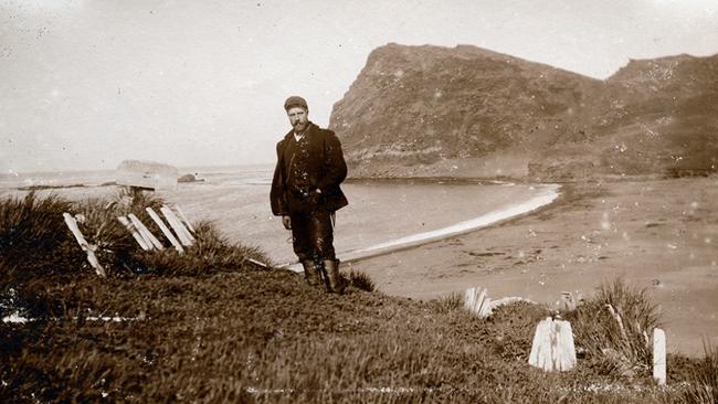 Anders Harboe-Ree standing in an old graveyard on Possession Island, Crozet Islands, 1906 or 1907.