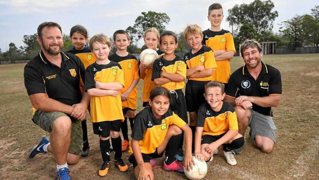 WELCOME KIDS: Dinmore Bushrats Soccer and Sports Club president Scott Morrison and junior coach Andrew Walker are keeping fine soccer traditions alive in the Riverview area. Picture: Rob Williams