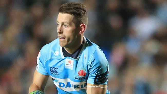 Waratahs half Bernard Foley in action on Saturday night.