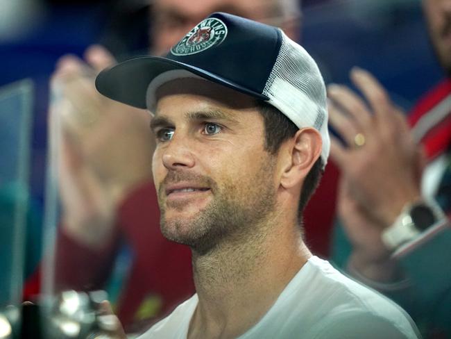 AFL player Trent Cotchin is seen in the crowd ahead of the first round match between Ash Barty of Australia and Lesia Tsurenko. Picture: AAP