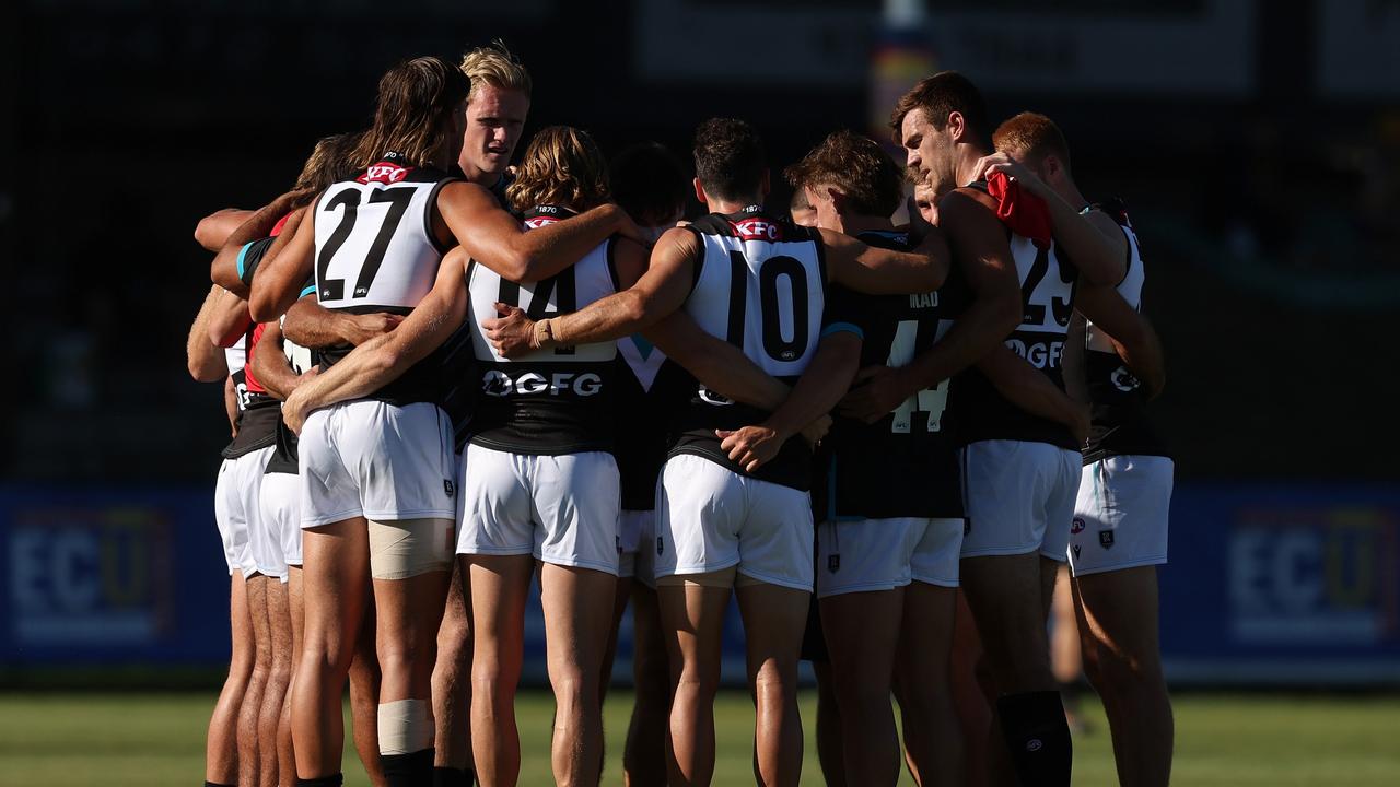 The Power form a huddle. Picture: Will Russell/AFL Photos via Getty Images