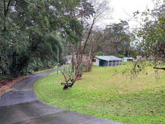 Current view of the site from the driveway.