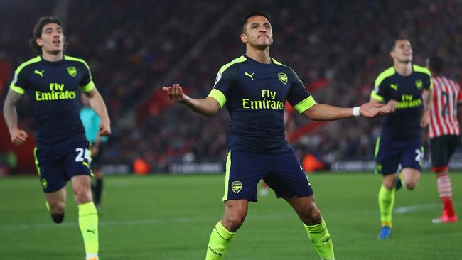 Alexis Sanchez of Arsenal celebrates scoring the opening goal.
