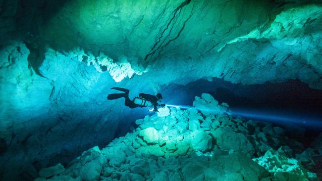 Cave divers explore the ghostly caverns beneath the Nullarbor Plain ...