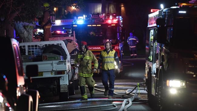 Firefighters at the scene of blaze in Aranda Dr, Frenchs Forest. Picture: Gordon McComiskie