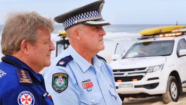 Tweed Byron Police District Inspector Matthew Kehoe and NSW Ambulance Inspector Terence Savage speaking at Salt Beach. Picture: Scott Powick