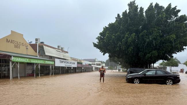 Harry Cobb in floodwaters in Mossman. Picture: Harry Cobb.