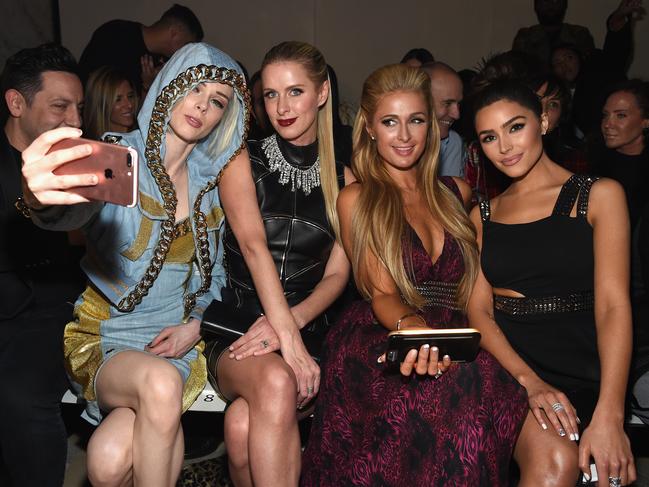 James Conran, Coco Rocha, Nicky Hilton Rothschild, Paris Hilton, and Olivia Culpo attend the Front Row for the Philipp Plein Fall/Winter 2017/2018 Women’s And Men’s Fashion Show at The New York Public Library on February 13, 2017 in New York City. Picture: Getty