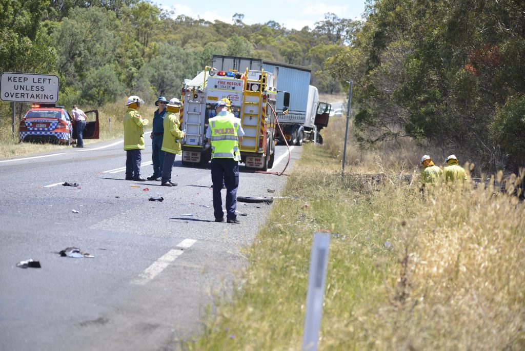 Emergency services at the scene of a fatal motorbike crash on the New England Hwy. Picture: Gerard Walsh