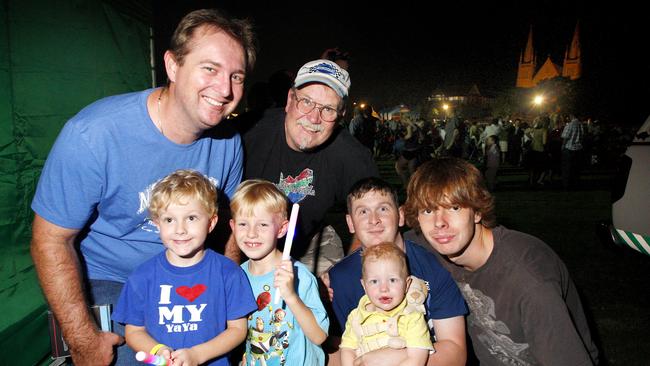 Steve Jones of Silkstone with his twins Justin (left) and Jack, 5, Bob Masmeyer of North Ipswich and his son George (right), 15, and Colin Fogarty of Raceview and his son Tyler, 2, at 2010 New Year’s Eve celebrations at Timothy Moloney Park. Picture: David Nielsen