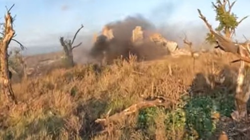 The strikes continue to hit around them as they try and get back to the house. Picture: YouTube