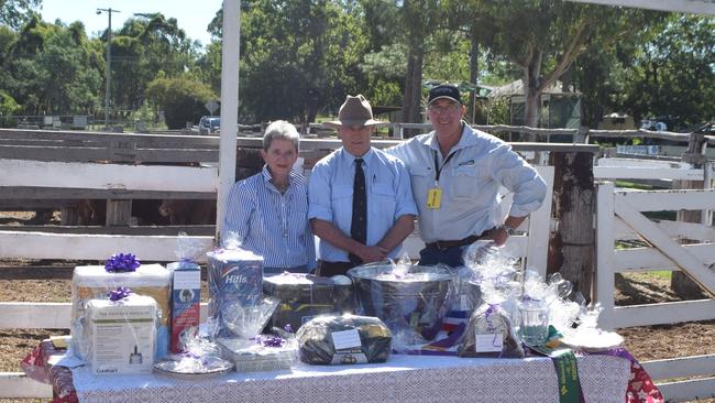 Nancy Gross, John Kiss and Glen Whitton at a Warwick Show prime cattle prize table.