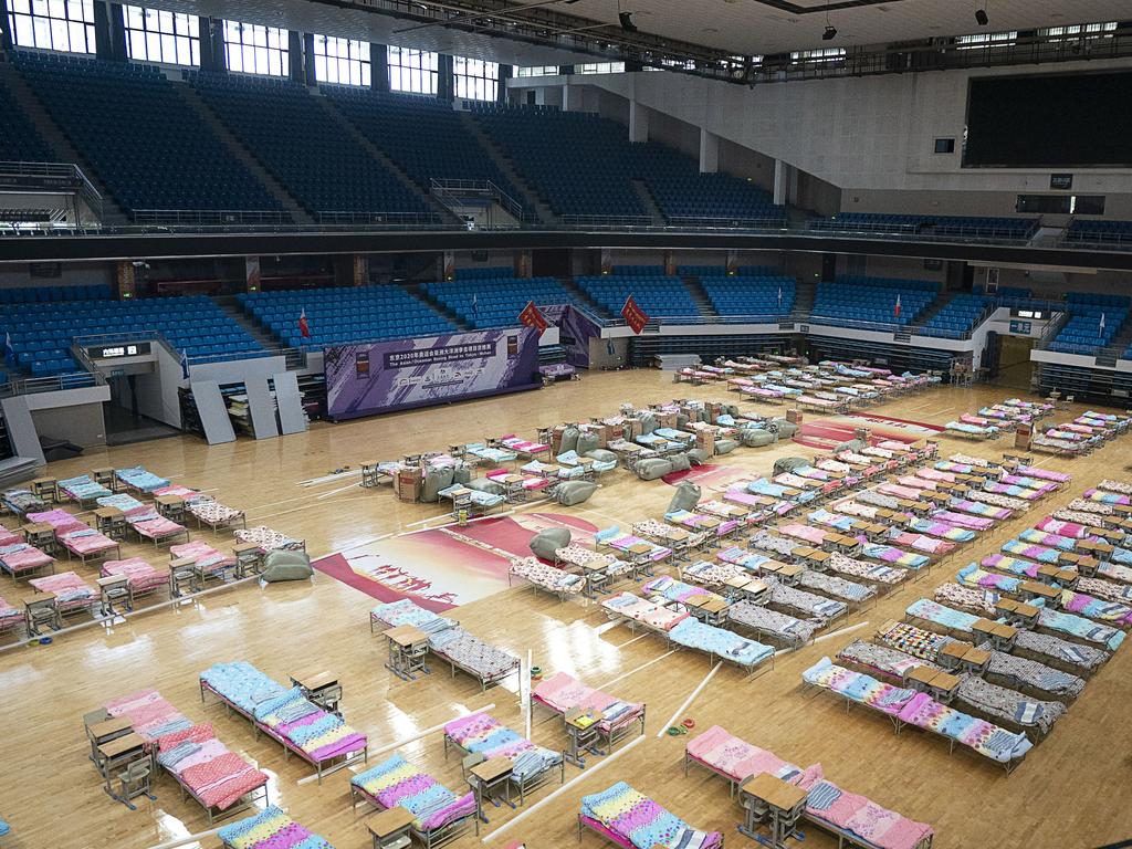 Beds are set up in the Hongshan Gymnasium in Wuhan in central China's Hubei Province to help provide extra beds for those afflicted with the virus. Picture: Xiong Qi/Xinhua via AP.