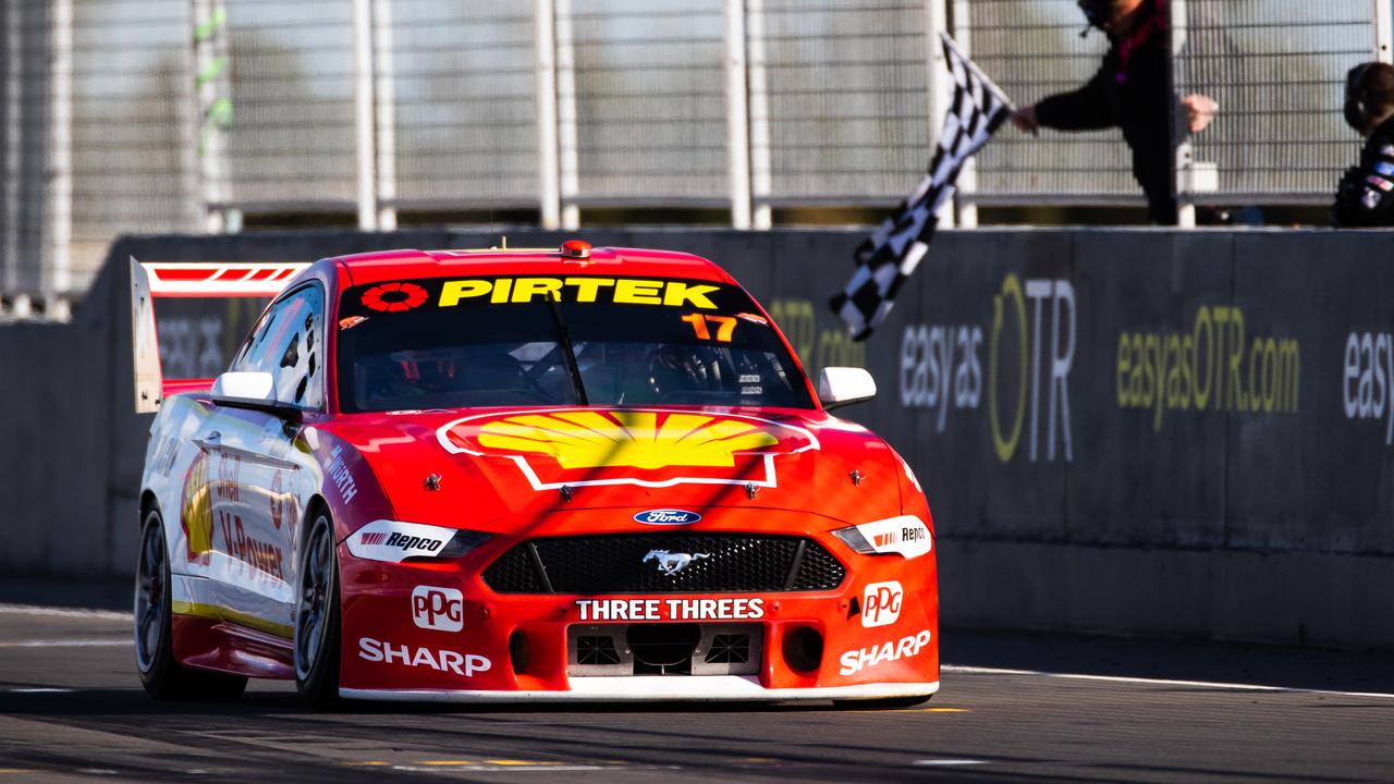 Scott McLaughlin takes the chequered flag — a regular sight in 2019. Picture: Daniel Kalisz