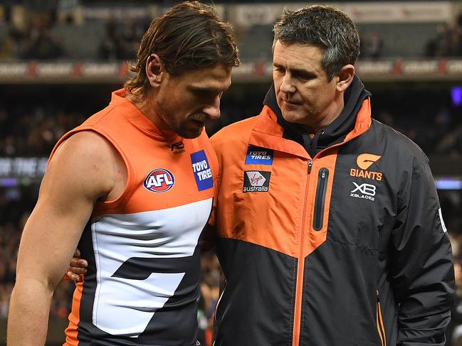 Coach of the Giants Leon Cameron (right) and Ryan Griffen are seen after the Second Semi Final between the Collingwood Magpies and the Greater Western Sydney (GWS) Giants in Week 2 of the AFL Finals Series at the MCG in Melbourne, Saturday, September 15, 2018. (AAP Image/Julian Smith) NO ARCHIVING, EDITORIAL USE ONLY