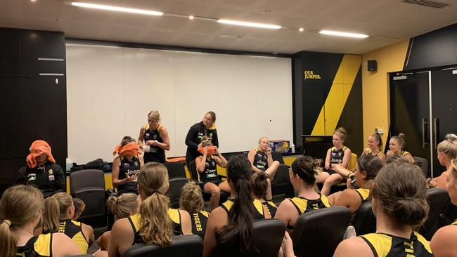 Richmond AFLW players take part in a team-building exercise at training.